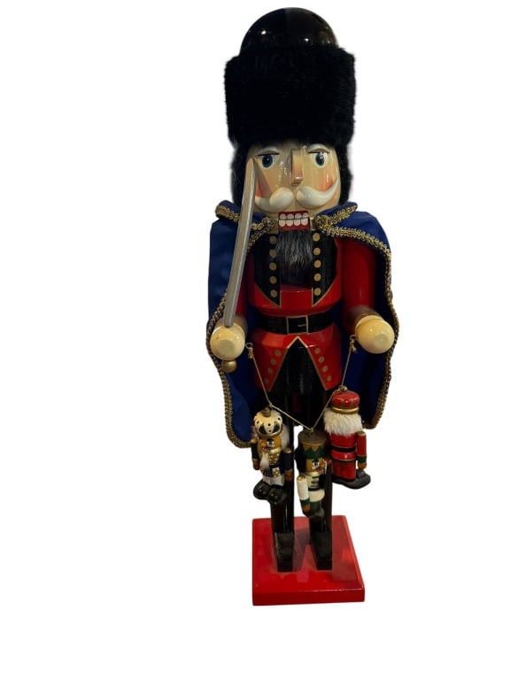 WOODEN NUTCRACKER WITH SWORD AND FIGURINES (1 of 3)