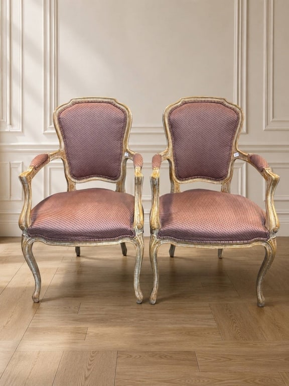 PAIR OF FRENCH LOUIS XV STYLE CHAIRS: Elegant pair of French Louis XV armchairs with carved wooden frames and mauve upholstery. Signs of gentle use. | | Measure approximately: 22" W x 38.5" H x | | Shipping Available at www.DeJaVuAuctionS
