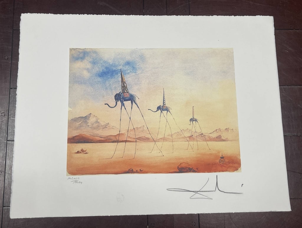 AFTER SALVADOR DALI SURREALIST ELEPHANTS PRINT 26": Decorative surrealist print after Salvador Dalí, featuring the artist’s iconic long-legged elephants crossing a dreamlike desert landscape with mountains and soft watercolor-style tones. The image 