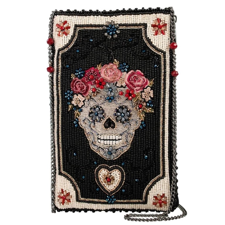 NEW MARY FRANCES BEADED SPIRIT BAG: A floral crowned skull purse steals the spotlight on a dark, beaded backdrop, framed with tiny blooms and a glowing heart. Moody, romantic, and full of attitude, it’s the kind of crossbody that love