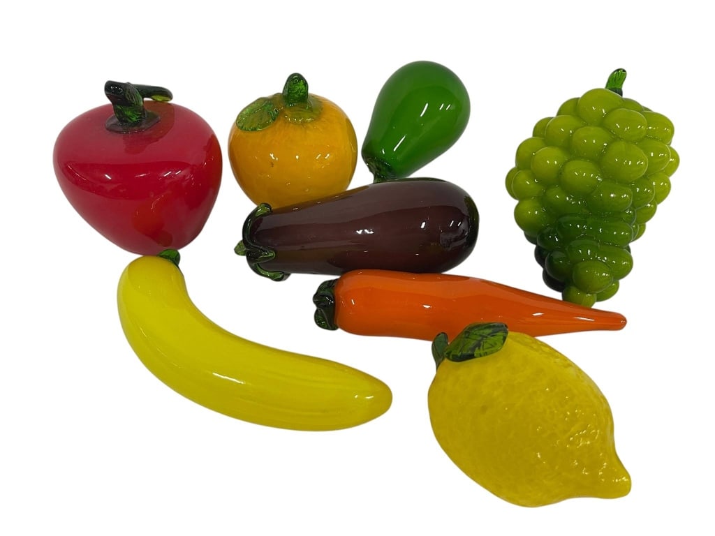 COLLECTION OF GLASS FRUITS SET OF 8 PIECES: Glass set featuring 8 pieces of assorted fruits. Includes apple, lemon, grapes, banana, carrot, eggplant, orange, and pear. Shipping Available at www.DeJaVuAuctionShipping.com. By bidding in this auct