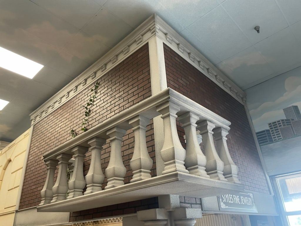 NYC INDOOR CITY FACADE CORNER RED BRICK W/ BALCONY: Location: Front Door East / Jewelry store CORNER facade. Approximately 12 ft tall on top of 7 ft column. Must be removed. FACADES are sold as shown in pictures, for visualization the ceiling is 19 fee