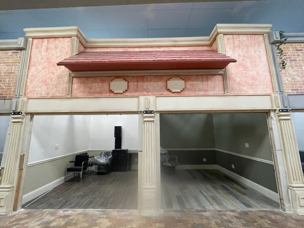 NYC INSIDE CITY FAUX STONE AWNING PINK BLDG FACADE: Inside city faux stone building facade. Located at 86LEX WW Cosmo zone. Buyer will need to uninstall this item to purchase. msn260422 FACADES are sold as shown in pictures, for visualization the ceili