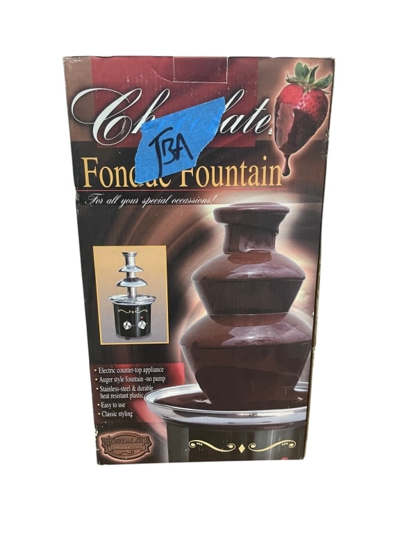 CHOCOLATE FONDUE FOUNTAIN COUNTERTOP APPLIANCE 15": Classic entertaining piece by Nostalgia Electrics, this electric chocolate fondue fountain is designed to create an elegant cascading chocolate display perfect for parties, weddings, and special occas