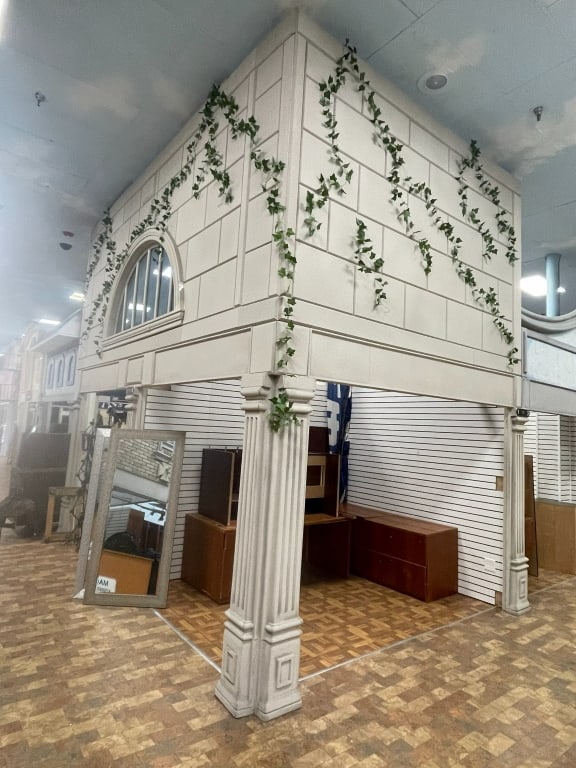 IVY COVERED LARGE WHITE TILE FACADE TWO COLUMNS (1 of 10)