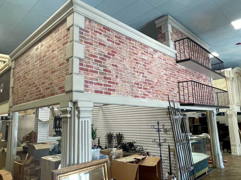 BRICK CORNER BUILDING FACADE W/ RAILING: FACADES are sold as shown in pictures, for visualization the ceiling is 19 feet tall and the columns are 7 foot. If the facade is parallel to column the measure will be approx from the column up. If