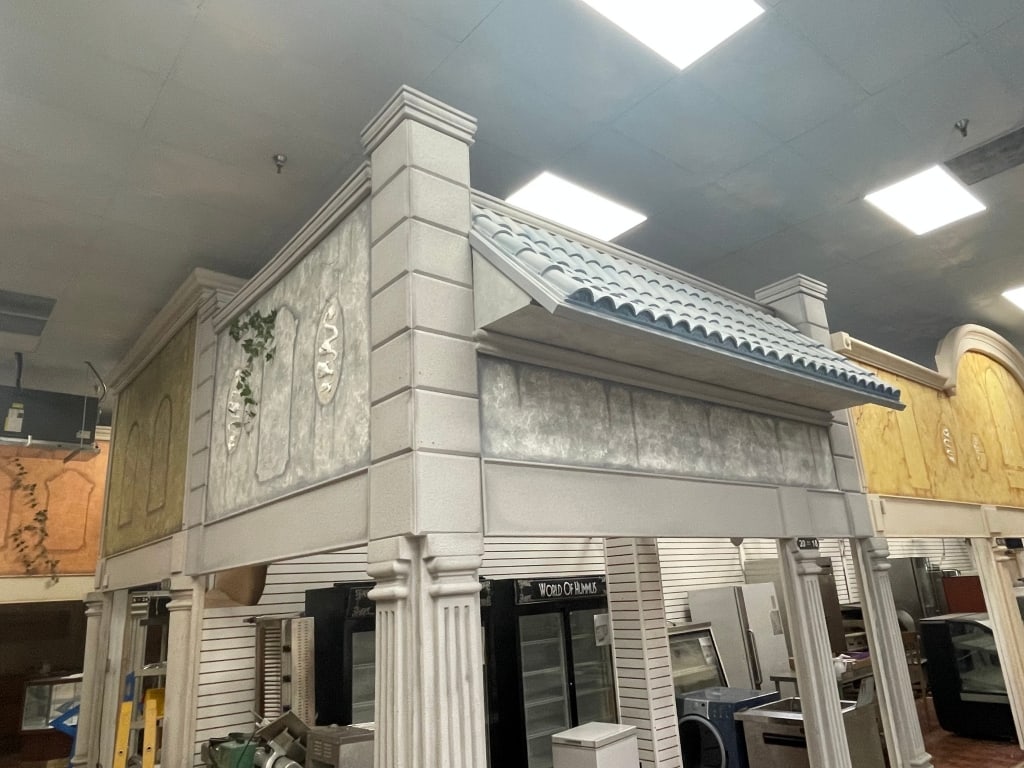 SLATE GRAY CORNER FACADE W/ BRICK AWNING: FACADES are sold as shown in pictures, for visualization the ceiling is 19 feet tall and the columns are 7 foot. If the facade is parallel to column the measure will be approx from the column up. If t