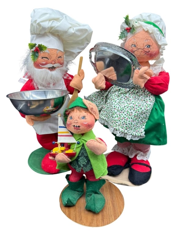 ANNLEE CHRISTMAS CHEF SANTA AND MRS CLAUS DOL: Annalee Dolls set includes Chef Santa with bowl and spoon, Mrs. Claus holding tray, and elf holding sailboat. Each figure features holiday attire and is crafted from fabric with expressive faces. Ship