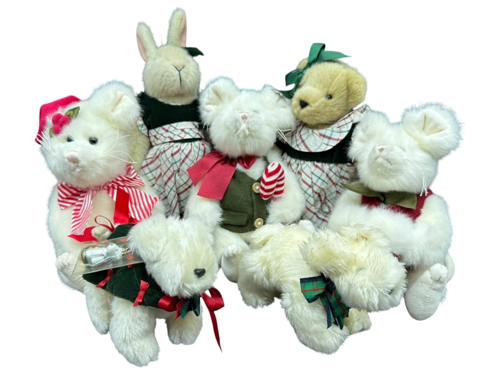 7 PLUSH WHITE HOLIDAY ANIMALS: 7 plush white holiday animal toys, including bears, a bunny, and mice, each in festive attire. Sizes vary as shown by ruler. Shipping Available at www.DeJaVuAuctionShipping.com. By bidding in this auc