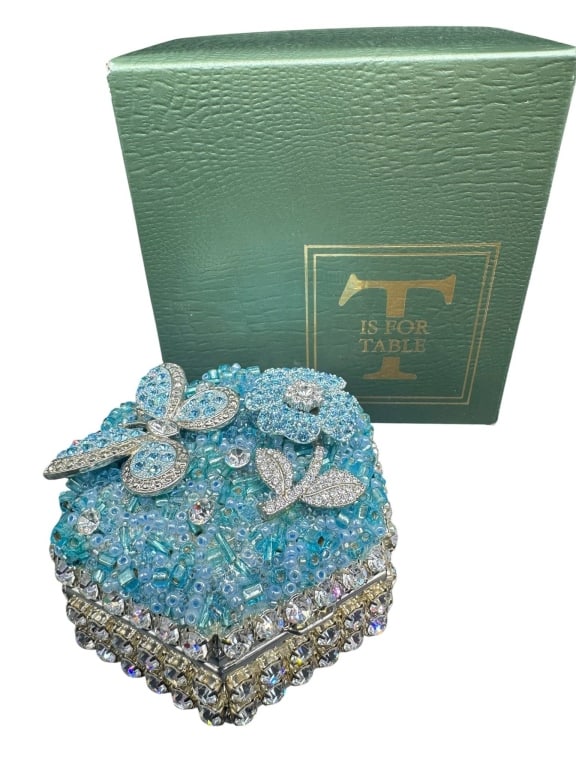 ISABELLA ADAMS BEJEWELED BUTTERFLY BOX: Isabella Adams hexagonal bejeweled trinket box featuring blue rhinestones, butterfly and flower motifs. Includes original box. By bidding in this auction you agree that you have read The Terms and con
