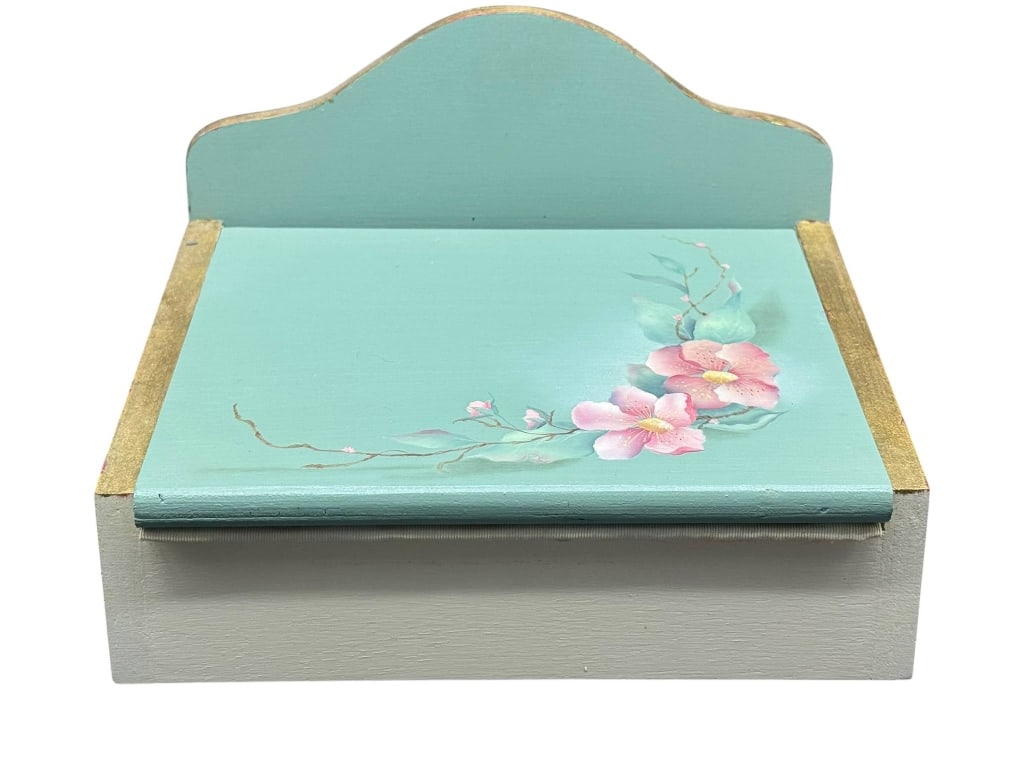 WOODEN FLORAL DECORATIVE KEEPSAKE BOX: Wooden keepsake box with hinged lid, painted in light blue and gold, featuring a hand-painted floral motif. Approximate size: 9 inches wide, 7 inches deep, and 7.5 inches tall. Shipping Available at w