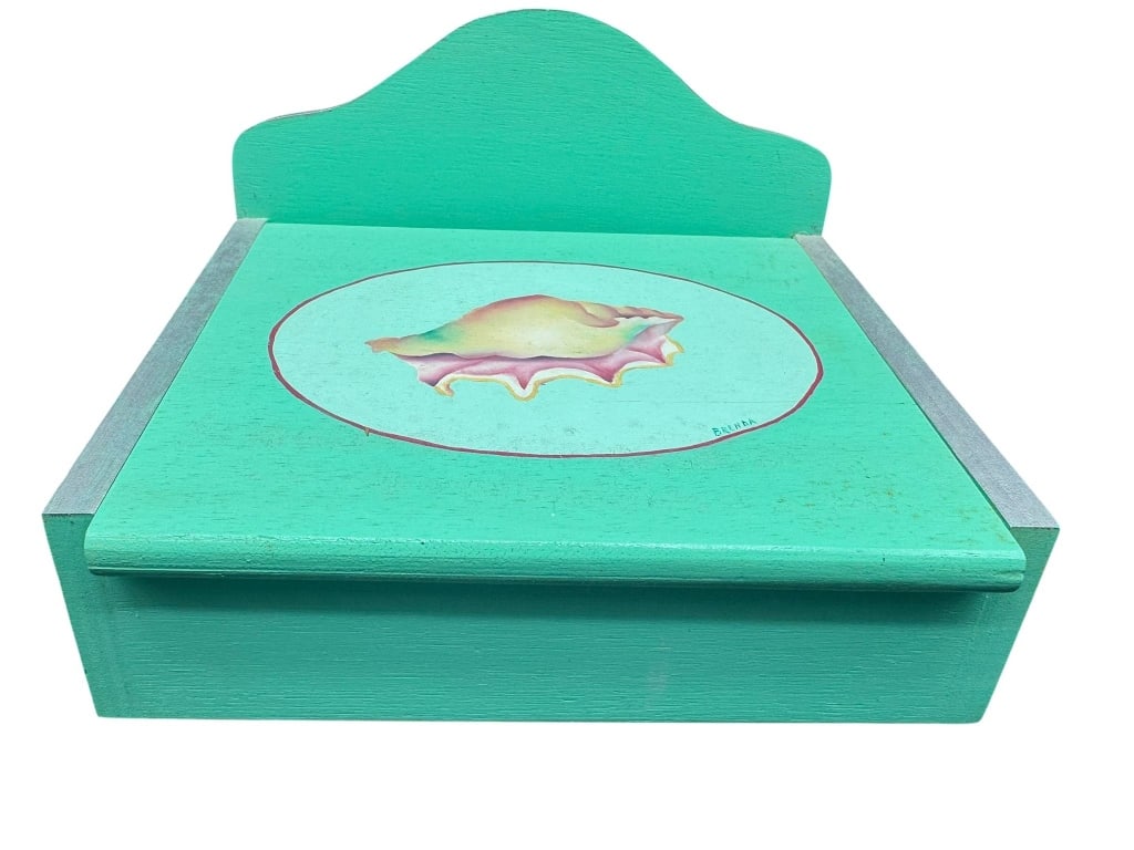 PAINTED WOODEN BOX WITH CONCH SHELL MOTIF: Painted wooden box featuring a conch shell design on the lid. The box has a hinged top, interior lining, and measurements visible alongside a standard ruler for scale. Shipping Available at www.DeJaVu