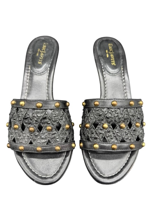 EMILY TYNES BLACK SLIP-ON SANDALS: Emily Tynes slip-on sandals. Black uppers with gold-tone rivet accents and woven pattern. Marked with brand logo on insole and sole. Shipping Available at www.DeJaVuAuctionShipping.com By bidding in t