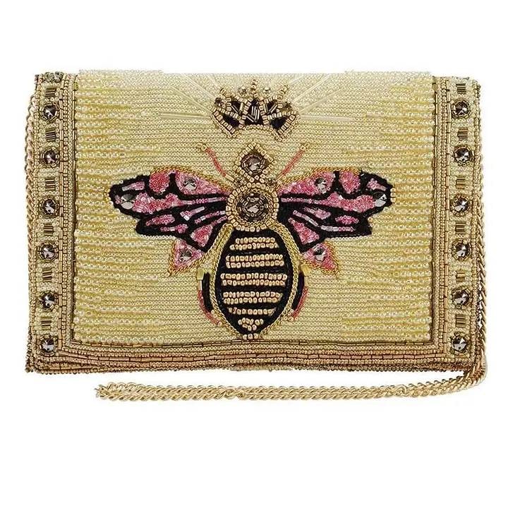 NEW MARY FRANCES BUZZED BEE BAG WITH CHAIN: New Mary Frances Buzzed Bee Bag featuring gold glam design. Clutch crossbody measures 8.75 x 1 x 6 inches. Includes a 50-inch removable crossbody chain strap with 22.5-inch drop, magnet closure, ivory
