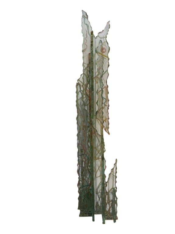 ABSTRACT ART GLASS SCULPTURE VERTICAL FORM 44": This striking abstract sculpture features vertical, jagged glass forms with a textured finish. Its organic silhouette brings to mind mountainous landscapes or natural rock formations. A compelling add