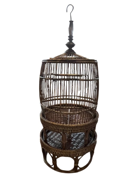 LARGE WICKER RATTAN HANGING BIRD CAGE 44": Large vintage hanging bird cage crafted in woven wicker/rattan with a rounded cylindrical form, domed top, decorative turned finial, and metal hanging hook. The cage features an open vertical slat des