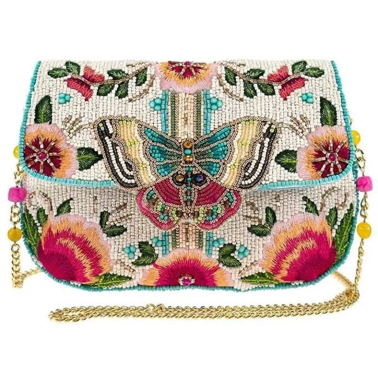 HAND-BEADED BUTTERFLY FLORAL CROSSBODY BAG: This vibrant crossbody bag features intricate hand-beaded detailing with a butterfly and floral design on the front. It includes a gold-tone chain strap with colorful bead accents and a turquoise fabr