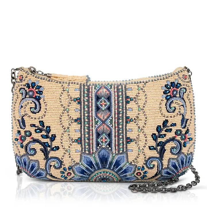 Laid-back with a timeless feel, this beaded: crossbody bag features a classic blue-and-cream color palette and an easygoing, allover pattern. The soft contrast gives it a relaxed boho vibe that’s effortless to dress up or down, making it a nat