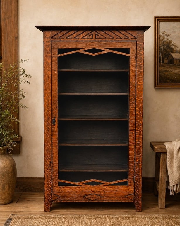 ANTIQUE OAK DISPLAY CABINET WITH GLASS DOOR: This antique oak cabinet features a glass-front door with geometric wood detailing and includes a brass key. Approximate dimensions are 54 inches high and 30 inches wide.