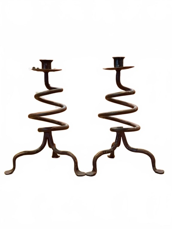 IRON SPIRAL CANDLESTICKS 11": Vintage iron candlesticks with coiled spiral stems and tripod bases. Each stands approximately 11 inches tall and 6 inches wide. Functional with a rustic, hand-forged appearance, ideal for antique or 