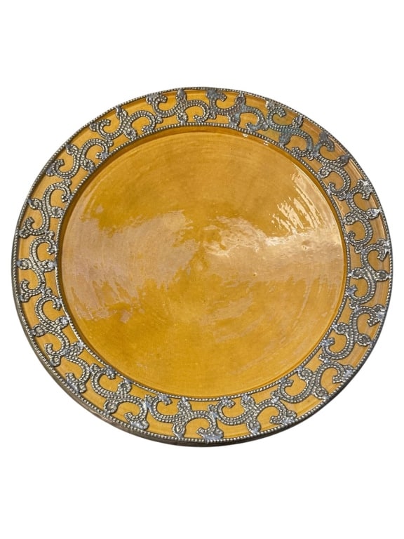 LARGE YELLOW GLAZED TERRACOTTA CERAMIC CENTERPIECE: Large yellow glazed ceramic compote featuring a decorative border with gray and silver swirls. Measures approximately 17 inches in diameter and 3.5 inches in height. The compote stands on a raised foo
