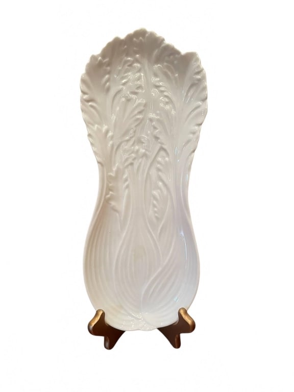 WHITE LETTUCE LEAF LONG CERAMIC SERVING PLATTER 11: Long white ceramic serving platter featuring an embossed lettuce leaf motif. Measures approximately 11 inches in length. Elegant and decorative, ideal for serving appetizers or displaying fresh produc