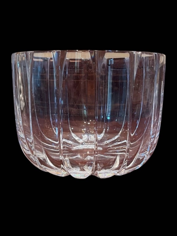 CUT CRYSTAL ROUND CENTERPIECE BOWL 5": This is a clear cut crystal bowl featuring a rounded, fluted exterior design. The bowl stands approximately 5 inches tall. The scalloped rim and heavy base reflect quality craftsmanship, making it bot