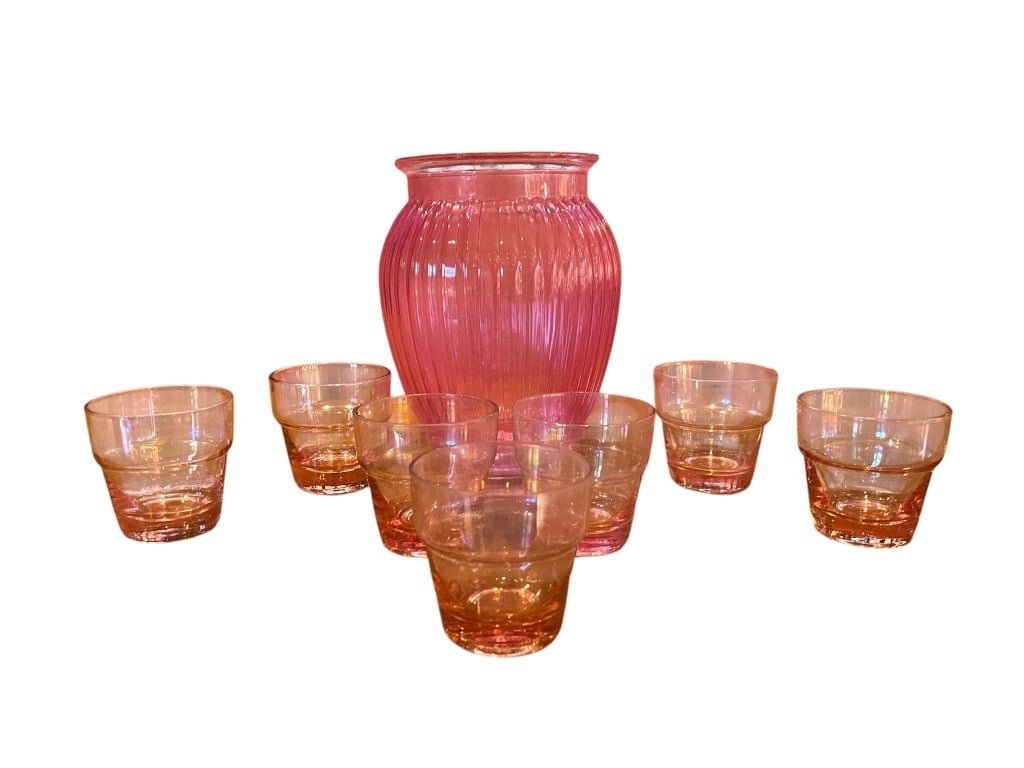 7 PCS TUMBLER SET WITH PINK GLASS VASE: One ribbed pink glass vase (approx. 7.5 inches tall, 5 inches wide) and seven pink iridescent tumblers (each about 3 inches high). Bright retro look, perfect for decor or serving.