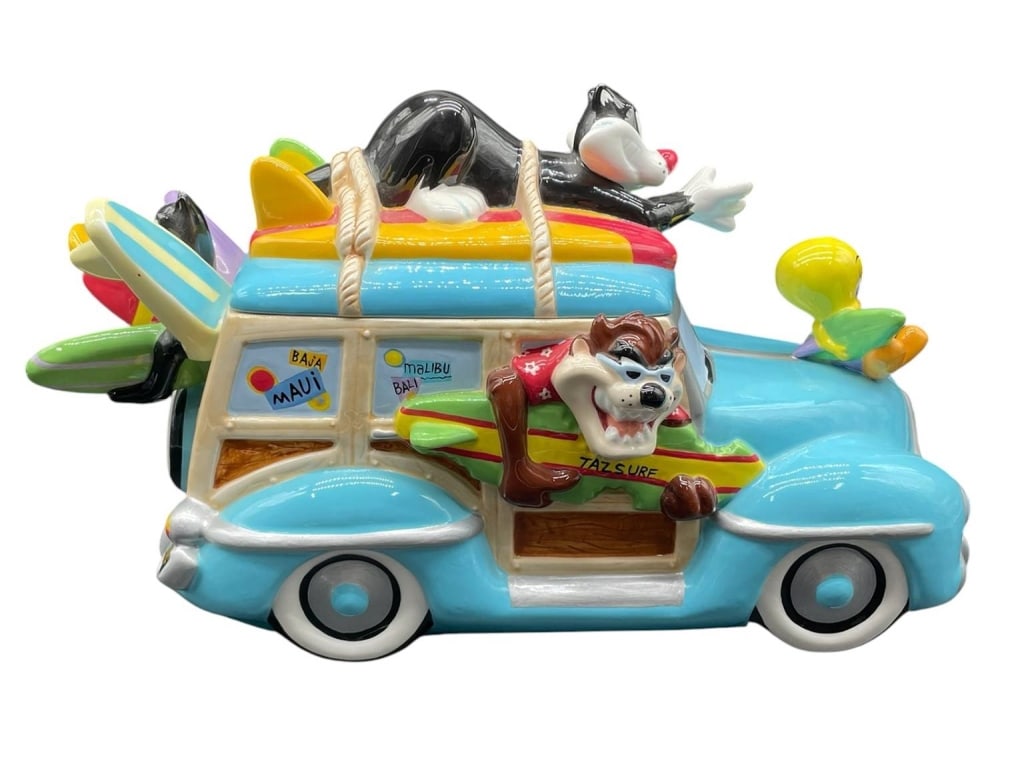 WARNER BROS CERAMIC COOKIE JAR 12": This Warner Bros. Studio Store cookie jar features classic Looney Tunes characters traveling in a blue woodie car with surfboards. Made in China and marked for handwash only. Designed exclusively for 