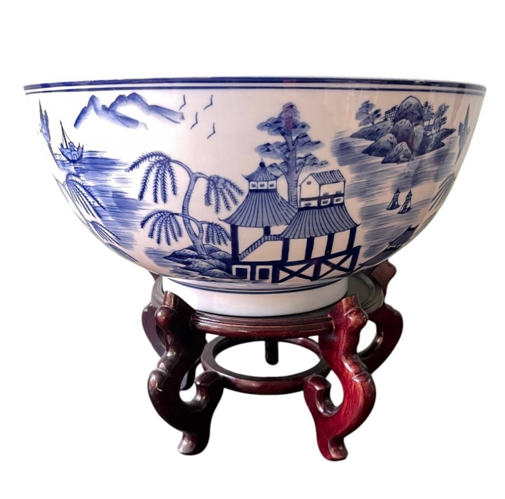 LARGE BLUE AND WHITE PORCELAIN BOWL WITH STAND 15": Classic blue and white porcelain bowl featuring hand-painted landscape and village scene, accompanied by an elegant carved wooden stand. Excellent for decorative or functional use. | | Measures with s