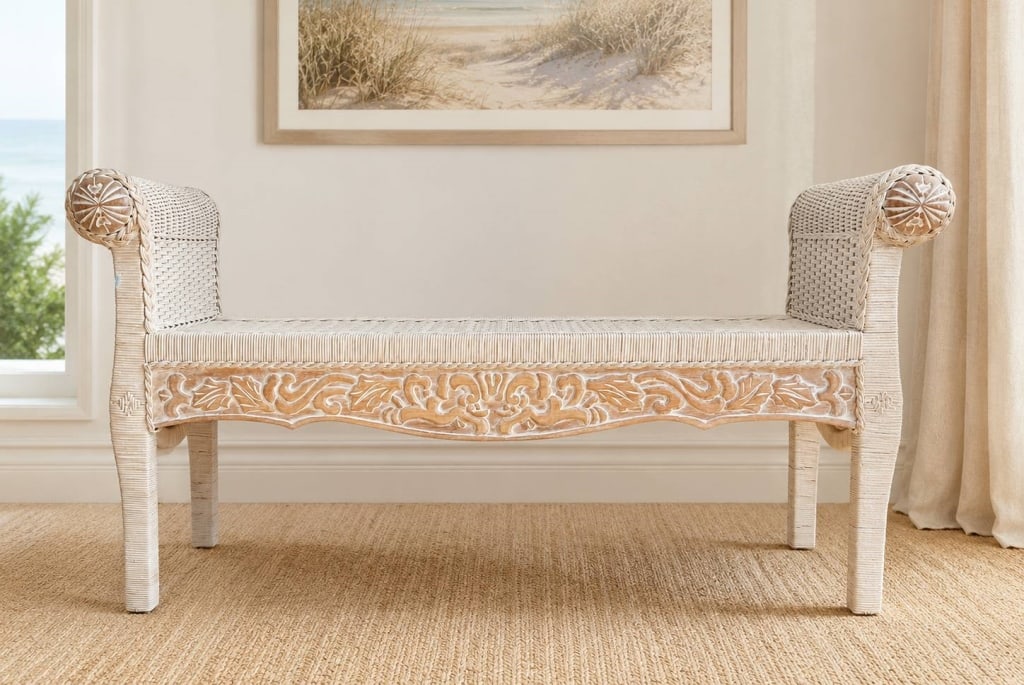 DECORATIVE WICKER BENCH WITH ROLLED ARMS 41": This vintage-style wicker bench features rolled arms, a woven seat, and distinctive carved wood embellishments on the apron. Measuring approximately 41" and 24" in height, it is ideal for a hallway or