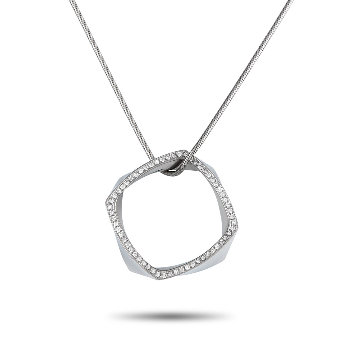 TIFFANY & CO. FRANK GEHRY PLATINUM 0.60CT DIAMOND: Minimal in appearance yet rich in style, this piece is a brilliant example of design that is both simple and ingenious. Designed by Frank Gehry for Tiffany & Co., this piece features a smooth and flex