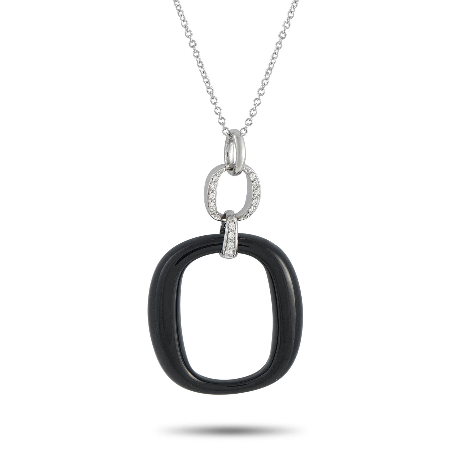 DAMIANI 18K WHITE GOLD DIAMOND AND ONYX NECKLACE #: A minimalist design gives this Damiani necklace a contemporary point of view. Suspended from a 19.5 chain, the dramatic pendant pairs black Onyx with sparkling inset Diamonds. The pendant is crafted f