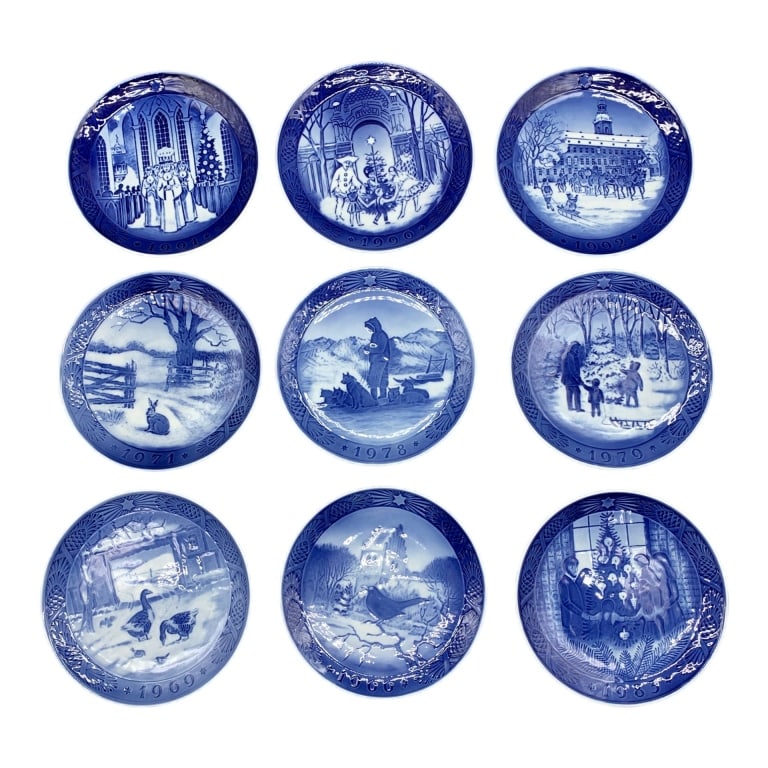 ROYAL COPENHAGEN CHRISTMAS PLATE LOT 1970-1999 7": 9 Royal Copenhagen blue and white porcelain plates, each depicting different Christmas scenes. Sporadic years dating from 1970- 1999. Each plate is about 7 inches in diameter and features holiday moti