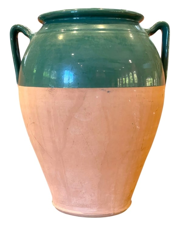 GLAZED TERRACOTTA FRENCH CONFIT JAR 11": Decorative two-handle terracotta confit jar featuring a classic urn-form body with a bold green glazed upper section, rounded rim, side handles, and natural terracotta lower body. The piece has a Medi