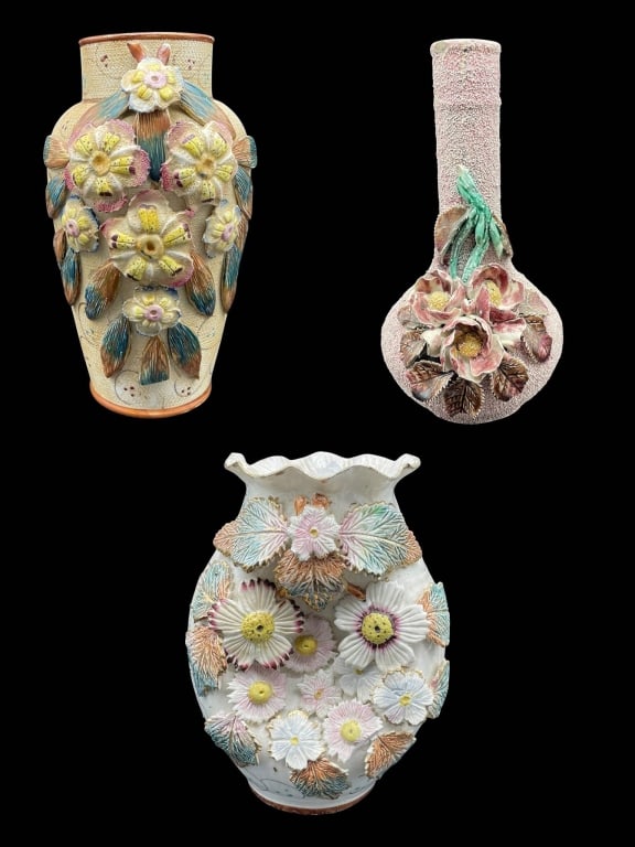 VINTAGE MAJOLICA STYLE FLORAL PORCELAIN VASE LOT: White porcelain vase with raised pastel floral and leaf decorations, featuring a fluted rim. Varying measurements, see all photos for measurement and condition details. Marked 'Italy' and numbered on 