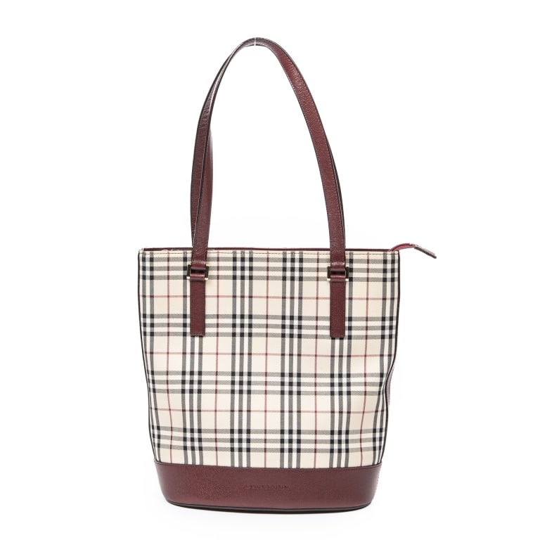 BURBERRY ZIP BUCKET TOTE NOVA CHECK BAG: The Burberry Zip Bucket Tote showcases the house's iconic Nova Check canvas in a classic beige and red colorway. Featuring a versatile bucket-inspired silhouette with a secure zip closure, this timele
