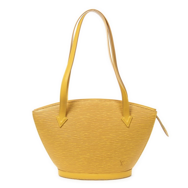 LOUIS VUITTON ST-JACQUES PM YELLOW EPI SHOULDER BG: The Louis Vuitton St-Jacques PM is crafted in vibrant yellow Epi leather and finished with elegant golden brass hardware. Distinguished by its structured silhouette and elongated shoulder straps,