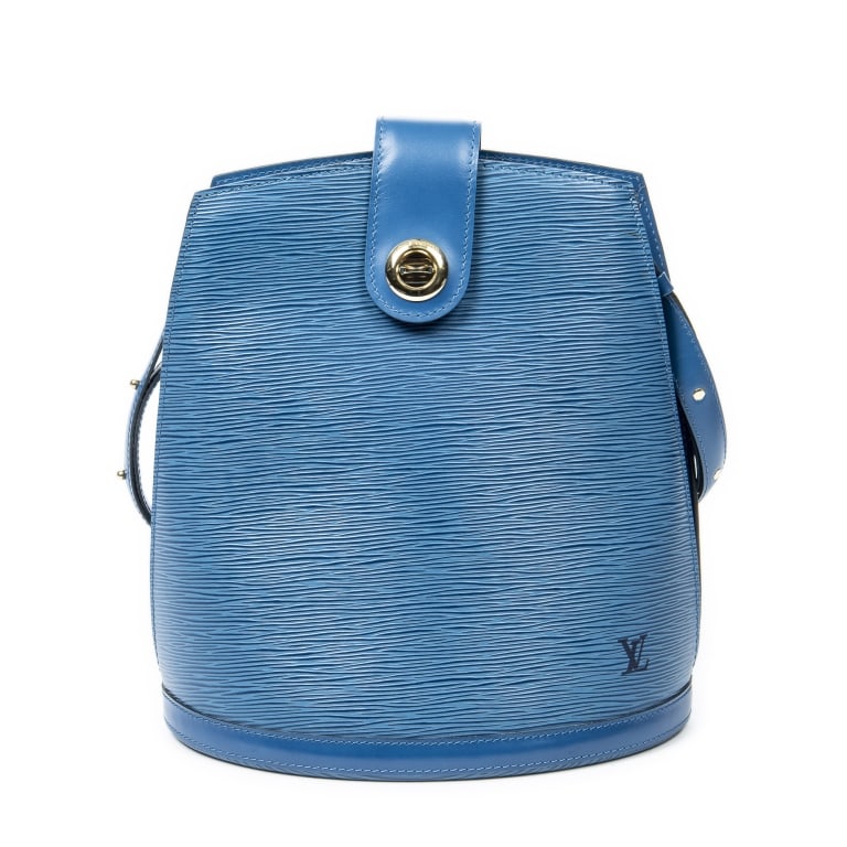 LOUIS VUITTON CLUNY BLUE EPI BAG: The Louis Vuitton Cluny is a timeless classic crafted in rich blue Epi leather and accented with elegant golden brass hardware. Featuring a structured silhouette and spacious interior, this iconic