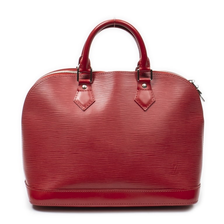 LOUIS VUITTON ALMA PM RED EPI BAG: The Louis Vuitton Alma PM is an iconic handbag crafted in vibrant red Epi leather and accented with elegant silver brass hardware. Originally inspired by Art Deco design, the Alma remains one of Louis