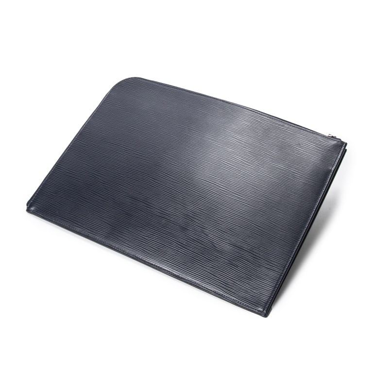 LOUIS VUITTON POUCHETTE JOUR GM EPI BAG: The Louis Vuitton Pochette Jour GM is crafted in sophisticated Blue Nuit Epi leather, showcasing the maison's signature textured finish and refined minimalist design. This elegant oversized pouch