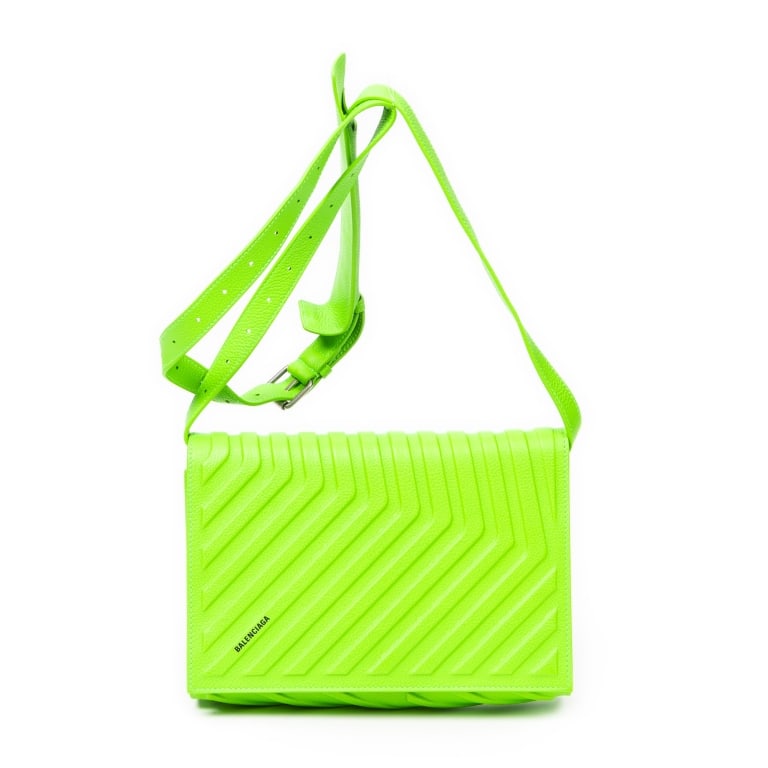 BALENCIAGA CAR FLAP GREEN CALF LEATHER BAG: The Balenciaga Car Flap Bag is crafted in luxurious green embossed calfskin leather and showcases the brand's distinctive contemporary aesthetic. Featuring a sleek flap silhouette and refined