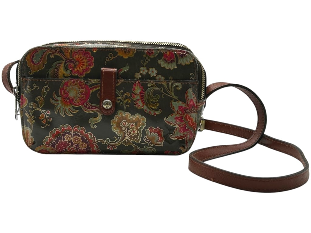 PATRICIA NASH FLORAL PRINT CROSSBODY BAG 8": Patricia Nash leather crossbody bag featuring a richly colored floral paisley print exterior with brown leather strap and trim, gold-tone zipper hardware, front slip pocket with snap tab closure, and