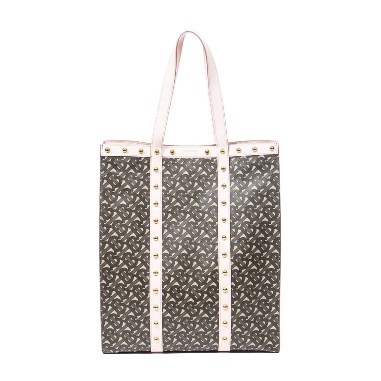 BURBERRY STUDDED TB MONOGRAM BOOK TOTE BAG: The Burberry Studded Vertical Book Tote is crafted in signature brown and light pink TB Monogram coated canvas, accented with striking studded detailing for a contemporary edge. Featuring a spacious