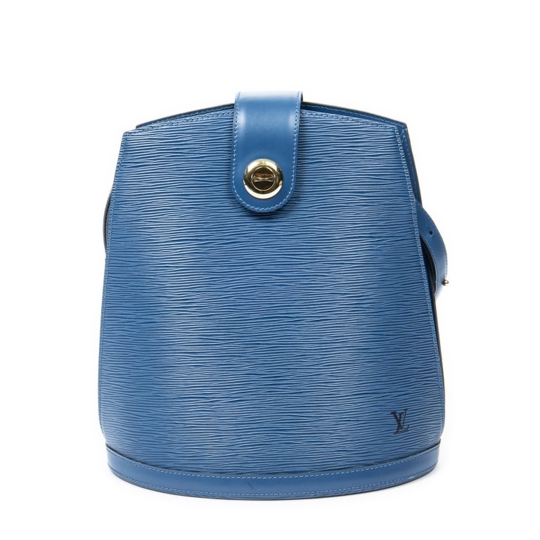 LOUIS VUITTON CLUNY BLUE EPI SHOULDER BAG: The Louis Vuitton Cluny is a timeless classic crafted in rich blue Epi leather and accented with elegant golden brass hardware. Renowned for its structured silhouette and spacious interior, this sophi