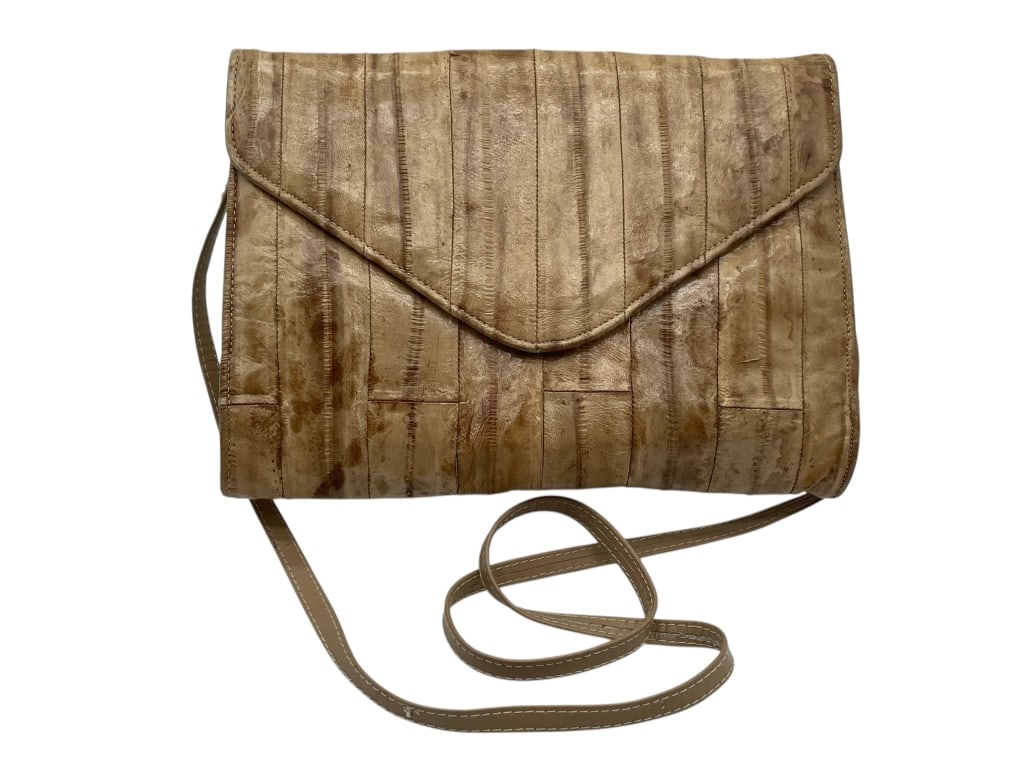 VINTAGE 60'S JASMIN HONG KONG EELSKIN LT BROWN BAG: PRETTY AND soft eelskin in classic mid mod design bagSkinny strap or tuck in and use as a clutchFabulous styleLined in black satin Masures 9" wide and 7" tall, flat bag.msn* By bidding on this