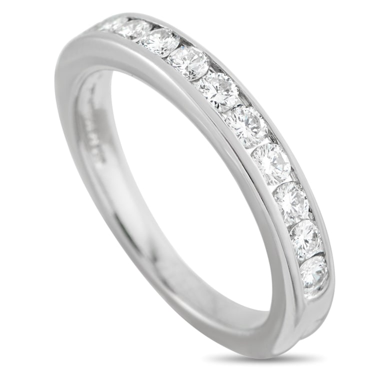 TIFFANY & CO. PLATINUM 0.44CT DIAMOND BAND RING TI: This Tiffany & Co. band ring will look chic no matter if its worn alone or stacked with other luxury pieces from your collection. Channel-set Diamonds with a total weight of 0.44 carats add subtle spa