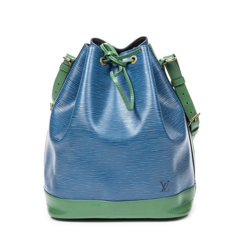 LOUIS VUITTON NOE GM BICOLOR EPI BAG: The Louis Vuitton Noe GM is a timeless bucket bag crafted in striking blue and green bicolor Epi leather, showcasing the maison's signature textured finish and exceptional craftsmanship. Originally de