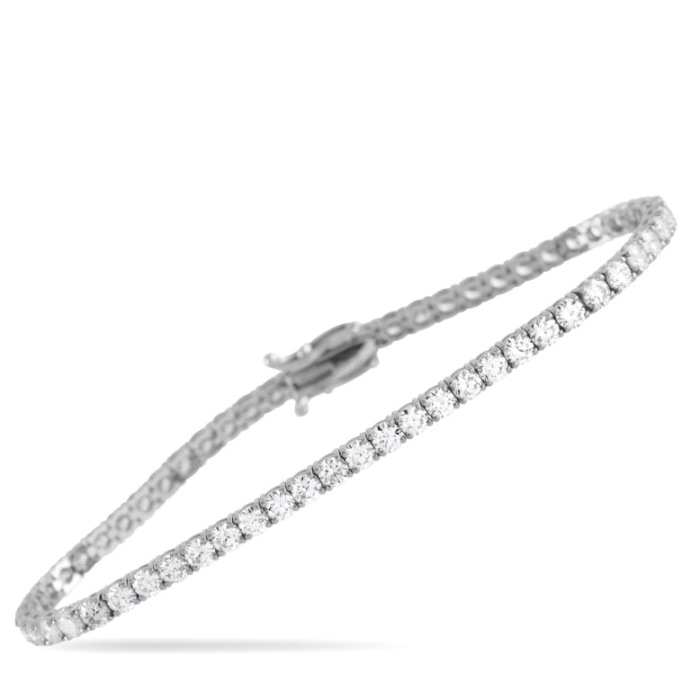 14K WHITE GOLD 6.0CT LAB-GROWN DIAMOND TENNIS BRAC: This sparkling tennis bracelet is an instant classic. A series of Lab Grown Diamonds with a total weight of 6 carats make this the perfect way to add luxury to any ensemble. Set in 14K White Gold, it 