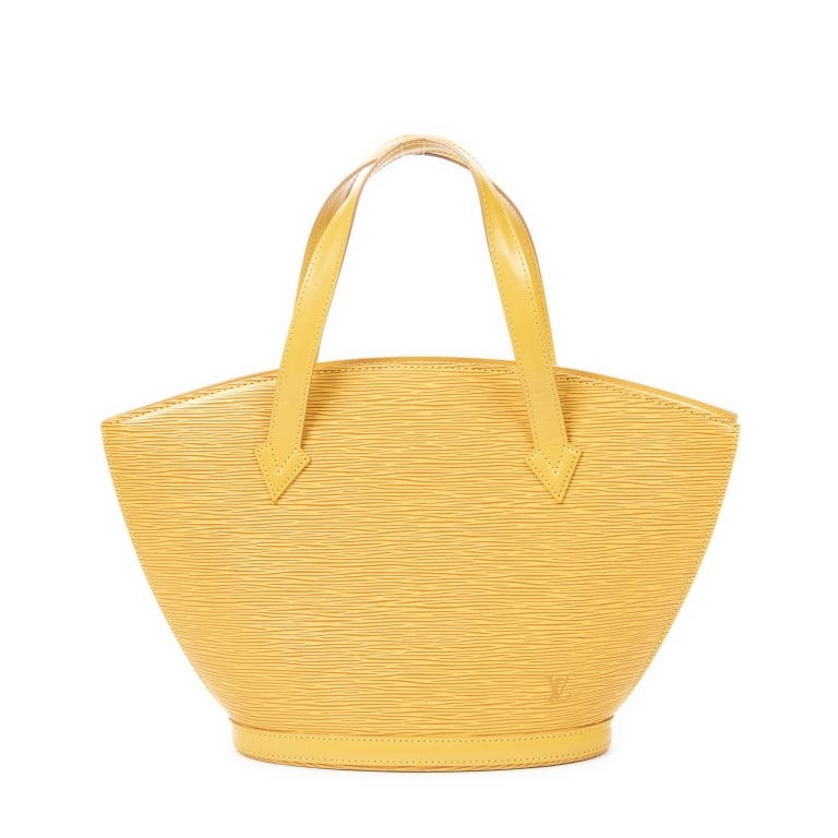 LOUIS VUITTON ST-JACQUES PM YELLOW EPI BAG: The Louis Vuitton St-Jacques PM is a timeless handbag crafted in vibrant yellow Epi leather, showcasing the maison's signature textured finish and exceptional craftsmanship. Defined by its elegant cur
